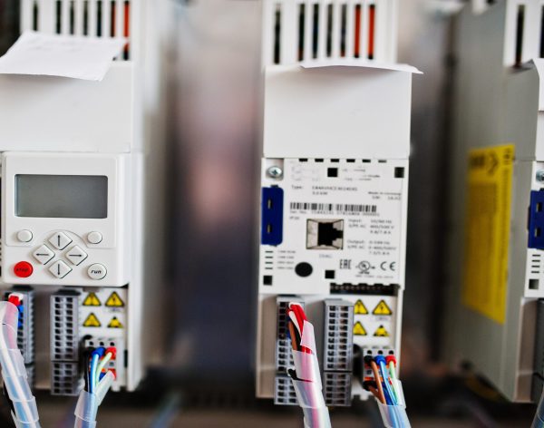 Electrical panel, electric meter and circuit breakers. Electric frequency converter, motor speed controller, rework station.