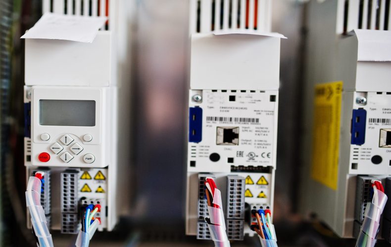 Electrical panel, electric meter and circuit breakers. Electric frequency converter, motor speed controller, rework station.