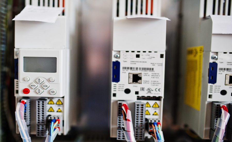 Electrical panel, electric meter and circuit breakers. Electric frequency converter, motor speed controller, rework station.